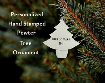 Unique and beautiful hand-stamped pewter ornament in the shape of a tree. We have only 3 and they will NOT get restocked.