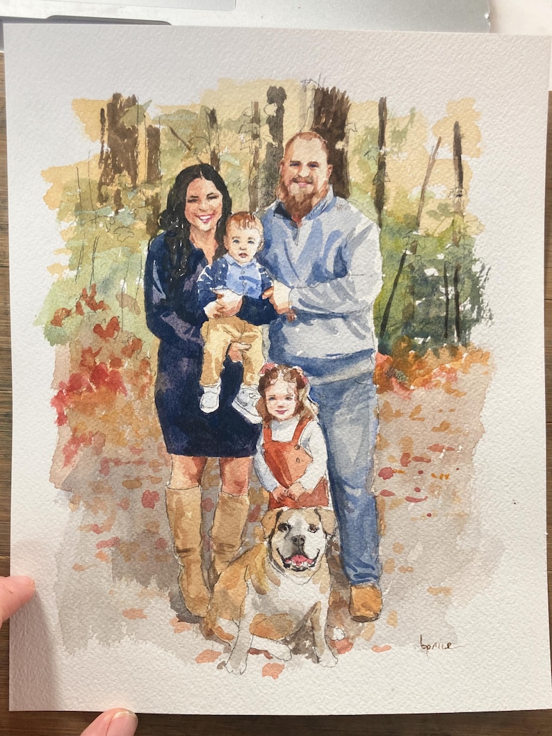 May include: Watercolor portrait of a family of four and a dog. The family is standing in front of a blurred background of trees and foliage. The portrait is painted in soft, warm colors, with the family members wearing casual clothing. The dog is a bulldog.