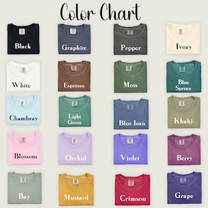 May include: A color chart displays various t-shirt colors, including black, white, and blue. The chart features the text "Color Chart" at the top, with each color labeled below the shirt. Other colors include green, pink, purple, and yellow.