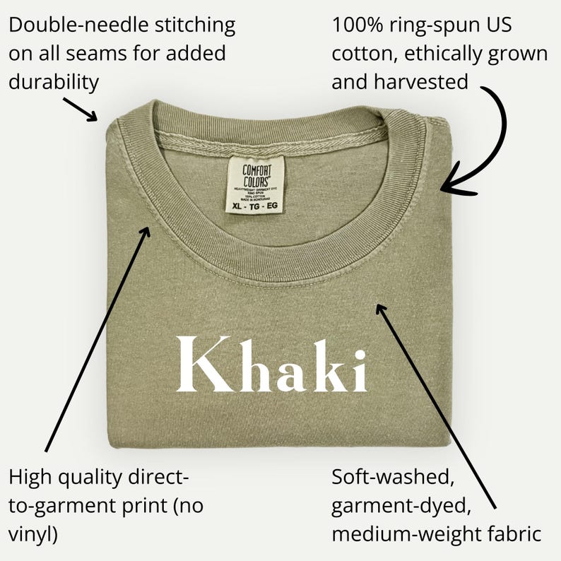 May include: Khaki-colored t-shirt with the word "Khaki" printed on the front. Features include double-needle stitching, 100% ring-spun US cotton, and a soft-washed, garment-dyed, medium-weight fabric. The shirt is ethically grown and harvested.