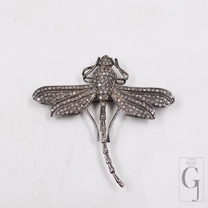 Broche antiguo de libélula con colgante de diamante talla rosa pavé de plata de ley 925 y acabado artesanal.