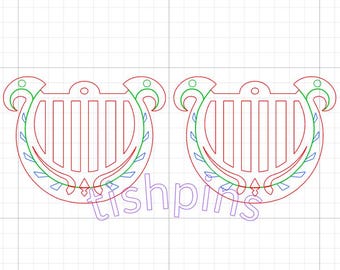 May include: Two laser-cut, red, green, and blue decorative harp-shaped ornaments. Each ornament has a series of vertical lines within the harp shape. The word "tishpins" is written across the bottom of the image.