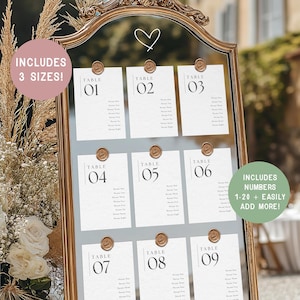 Puede incluir: Un espejo con marco dorado muestra nueve tarjetas de mesa, cada una numerada del 01 al 09. Las tarjetas se sujetan con cierres redondos de color bronce. El texto indica que incluyen los números 1-20 y se pueden añadir más fácilmente.