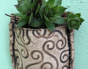 Pouches for hanging plants