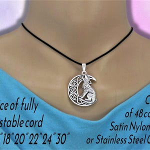 May include: A silver-toned pendant featuring a wolf howling at a crescent moon with Celtic knotwork and a star, suspended on a black cord. Text reads: Choice of fully adjustable cord or 16" 18" 20" 22" 24" 30" and Choice of 48 colours Satin Nylon Cord or Stainless Steel Chain.
