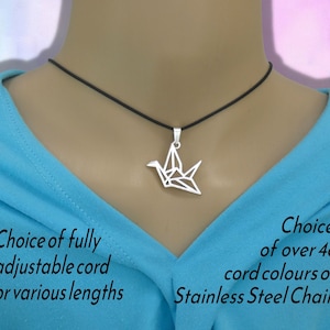 May include: Silver origami crane pendant necklace with a choice of fully adjustable black cord or various lengths, or a stainless steel chain.  Choice of over 48 cord colors.