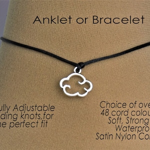 May include: A black satin nylon cord anklet or bracelet featuring a silver-toned cloud charm. The text reads: Anklet or Bracelet, Fully Adjustable sliding knots, for the perfect fit, Choice of over 48 cord colours Soft, Strong & Waterproof Satin Nylon Cord.