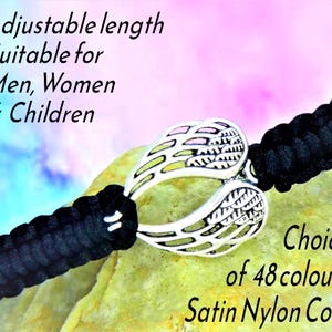 May include: Black satin nylon cord bracelet with a silver-coloured wing charm. The text indicates an adjustable length and a choice of 48 colours. Suitable for men, women, and children.
