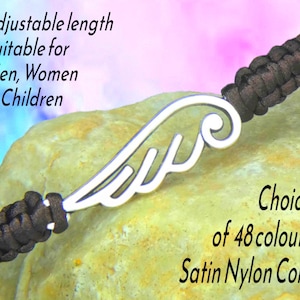 May include: A bracelet with a silver wing charm and a dark brown satin nylon cord. The text on the image says "Adjustable length Suitable for Men, Women & Children" and "Choice of 48 colours".