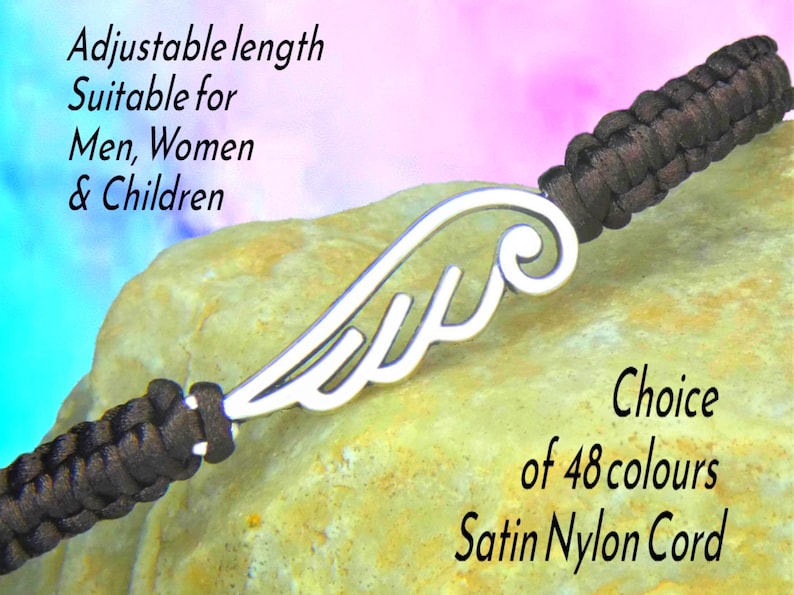 May include: A bracelet with a silver wing charm and a dark brown satin nylon cord. The text on the image says "Adjustable length Suitable for Men, Women & Children" and "Choice of 48 colours".