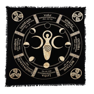 May include: A black tapestry with a gold circle design featuring the eight sabbats of the Wheel of the Year. The circle includes the names of each sabbat, the dates, and a stylized image of a triple goddess.