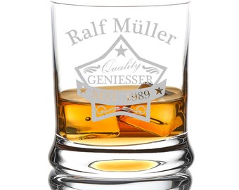 Whiskey glass including engraving quality star