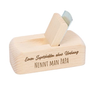 Beer opener with superhero motif without cape