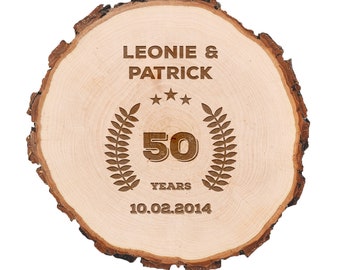 Alder wood tree slice with personalized anniversary motif