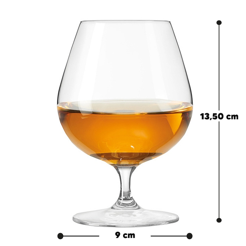 May include: A clear brandy glass filled with amber liquid. The glass measures 13.50 cm in height and 9 cm in width. The glass has a rounded bowl, a stem, and a wide base. The liquid inside appears to be a spirit.