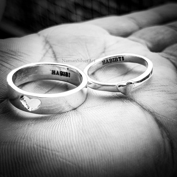 Premium Photo | Wear a ring wedding ring love couple