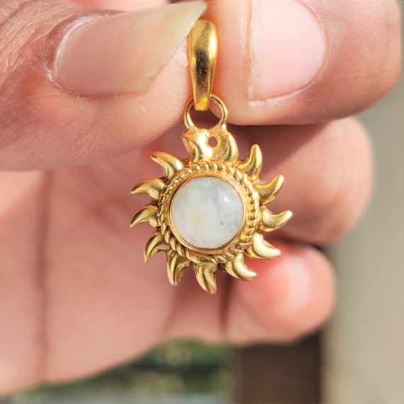 Gold locket deals sun