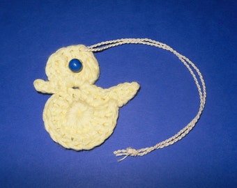 Poussin au crochet, Marque-page