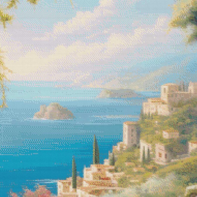 May include: A cross-stitch landscape depicts a coastal scene with a blue sea, islands, and a town on a hillside. The sky is a mix of blue and white, with hints of yellow. The buildings are white with red roofs.