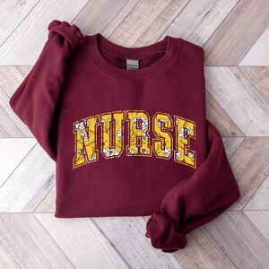 Toile Nurse Sweatshirt Gift for ER Nurse Collegiate Nurse Crewneck Gift for Nursing Student Christmas Gift for RN Nurses Week Gift