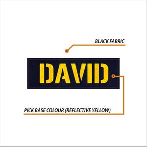 Op de afbeelding: Een rechthoekige patch met de naam "DAVID" in reflecterende gele letters op een zwarte stoffen achtergrond. De tekst "PICK BASE COLOUR (REFLECTIVE YELLOW)" staat eronder, en "BLACK FABRIC" erboven.
