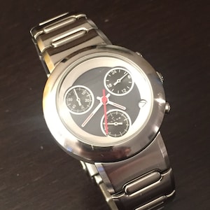 Space Age Women&#39;s &#39;Cross Brand Stainless Steel Quartz Watch