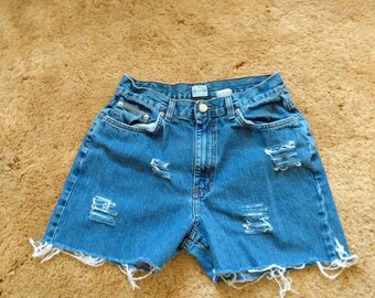 Calvin Klein Jean cutoff shorts, Distressed size 8,