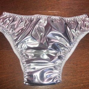 Shiny silver foil lined white satin bikini panties, all sizes