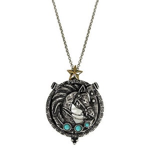 May include: Silver necklace with a burnished pendant featuring a horse head design with turquoise stones. The pendant has a star charm at the top.