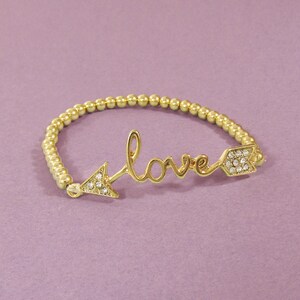 Stoned Twisted Love Arrow Ball Beads Stretchable Bracelet