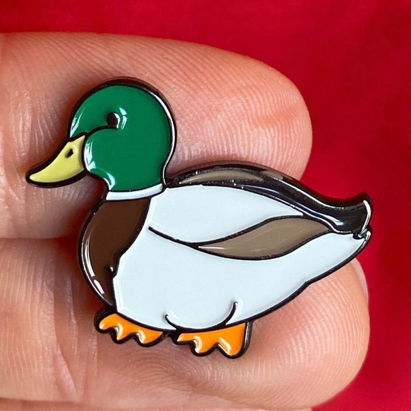Chubby little duck enamel pin