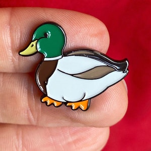Chubby little duck enamel pin