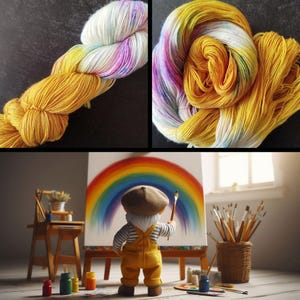 Könnte beinhalten: Zwei Stränge bunter Wolle, einer in Gelb-, Weiß- und Lilatönen, der andere in Gelb und Weiß. Darunter malt eine Figur eines Malers in gelben Overalls und einer braunen Mütze einen Regenbogen auf eine Leinwand. Pinsel und Farbtöpfe sind in der Nähe.