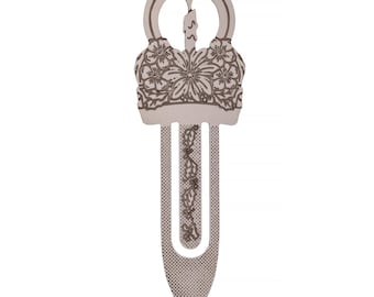 May include: Silver metal bookmark with a floral design and a candle in the center. The bookmark has a decorative top and a pointed tip.