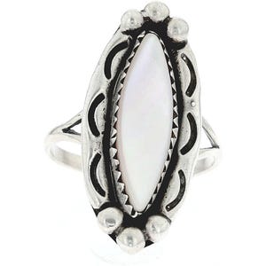 May include: A silver ring with a white mother-of-pearl oval stone set in a detailed silver design.