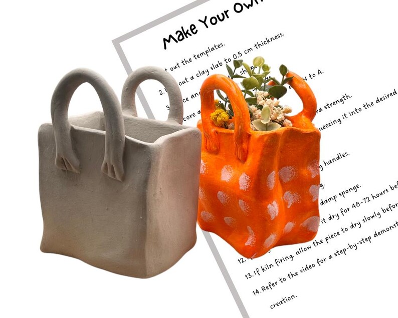 May include: Two ceramic planters shaped like shopping bags. One is white with a simple design and the other is orange with white polka dots. Both planters have handles.