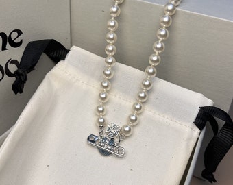 Vivienne Westwood Silberhalsband Aquablaue Kugelhalskette mit Swarovski-Perle und Kristallen