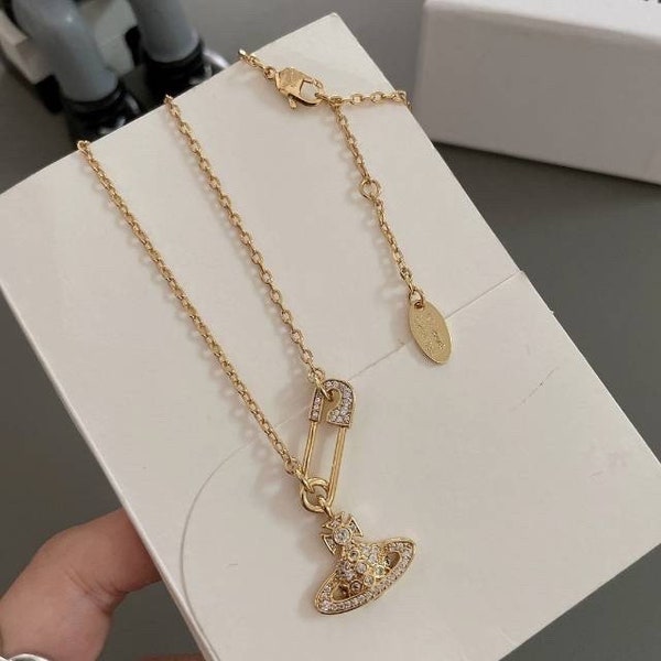 Vivienne Westwood Collar Gold Lucrece Orb Safety Pin Chain con cristales swarovski