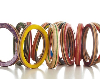 Bangle made from recycled skateboards