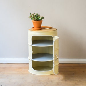 Night stand made from small oil drums Beige