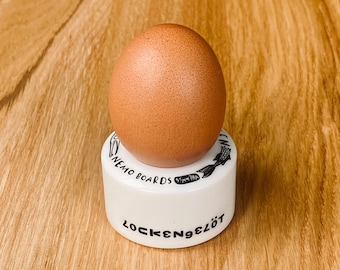 Egg Flip - the egg cup made from upcycled skateboard wheels