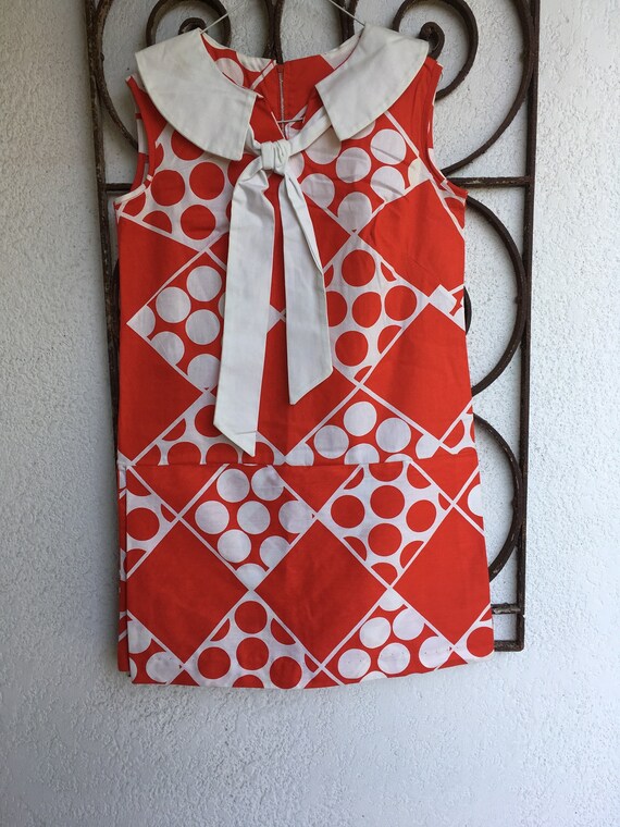 red and white playsuit