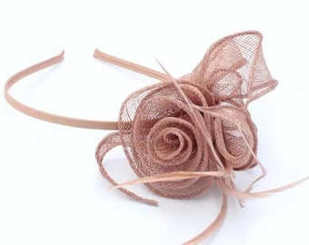 Mocha coiled and looped sinamay fascinator with feathers on a narrow matching coloured satin fabric aliceband.