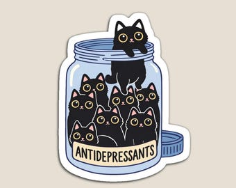 May include: A magnet featuring a cartoon illustration of black cats inside a blue jar. The jar has a label that reads "ANTIDEPRESSANTS". One cat is peeking out of the jar, while others are inside. The magnet has a white border.