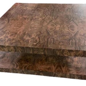 May include: A square coffee table constructed from wood with a prominent burl grain pattern. The table features a flat top surface and a lower shelf supported by four thick, straight legs, showcasing a rich brown color with swirling wood grain.