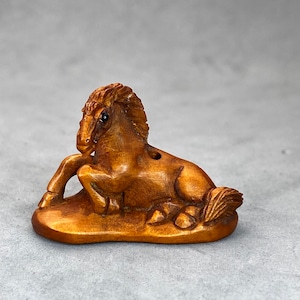 1 Hand carved Boxwood ojime of a seated horse, year of the horse, signed by artist, wood horse charm, wood horse toggle, kimono accessory