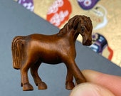 1 Hand carved Boxwood ojime of a standing horse, year of the horse, signed by artist