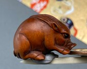 1 Hand carved Boxwood ojime of a pig, wood boar bead, year of the boar, signed by artist
