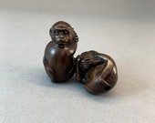2 Hand carved teakwood ojime of monkey, wood monkey netsuke, teakwood monkey bead, year of monkey
