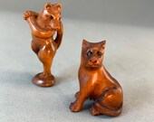 2 Hand carved Boxwood ojime of Japanese mythical animal, dancing fox, dog